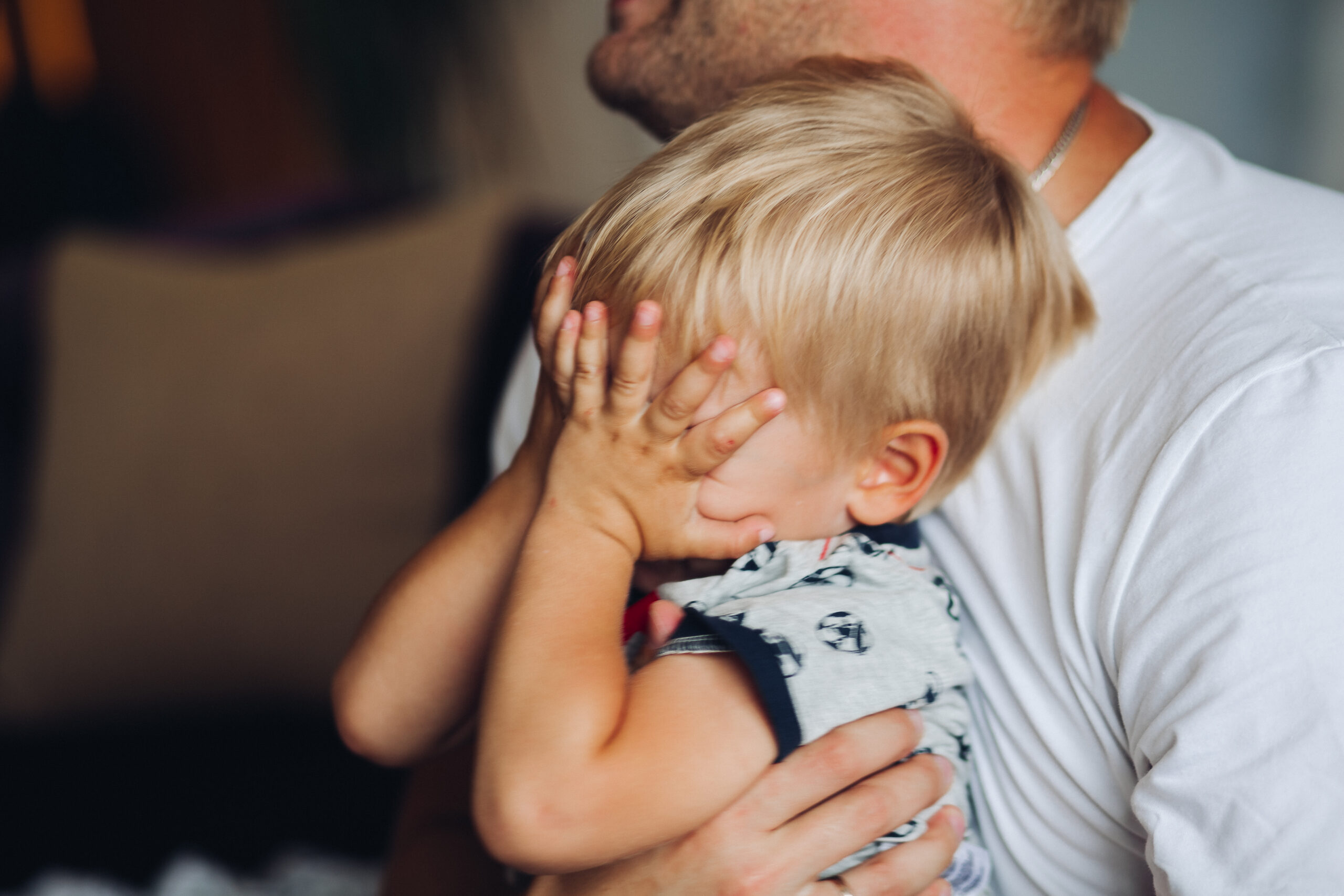 The baby is crying. The little boy is crying heavily.